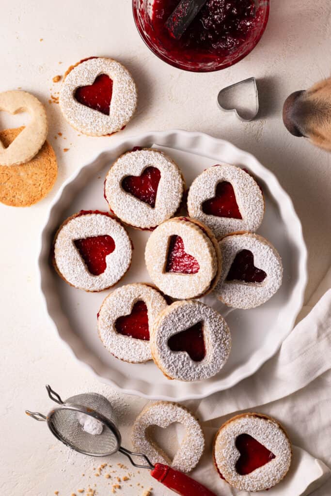 raspberry-pecan liner cookies on a board