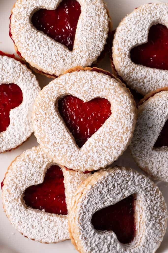 raspberry-pecan liner cookies on a board