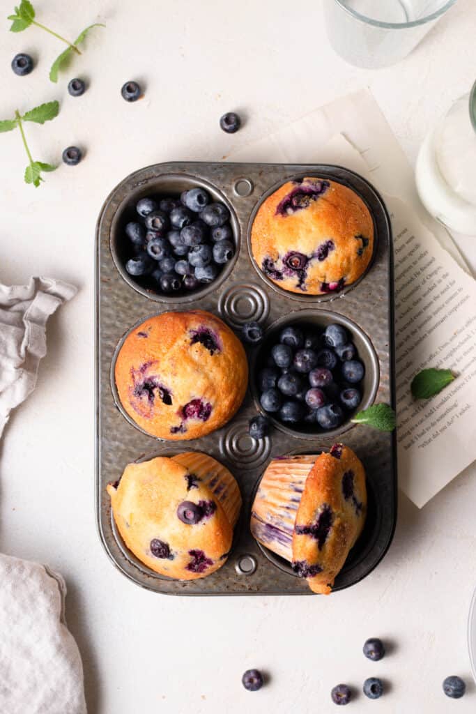 blueberry muffins in a muffin tin