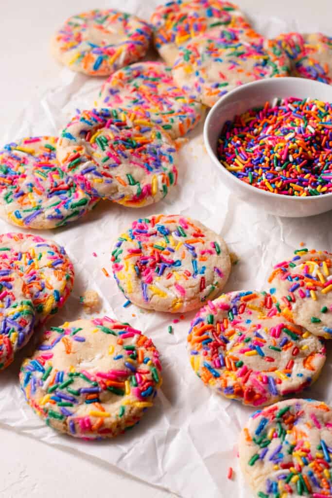 funfetti sugar cookies on a board