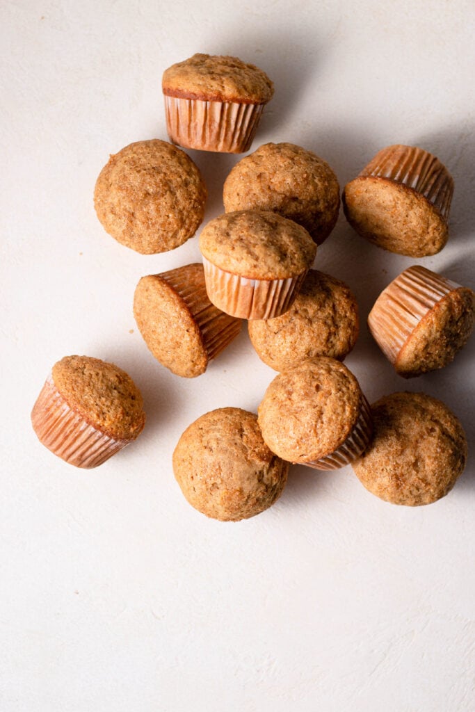 carrot cake muffins scattered around each other