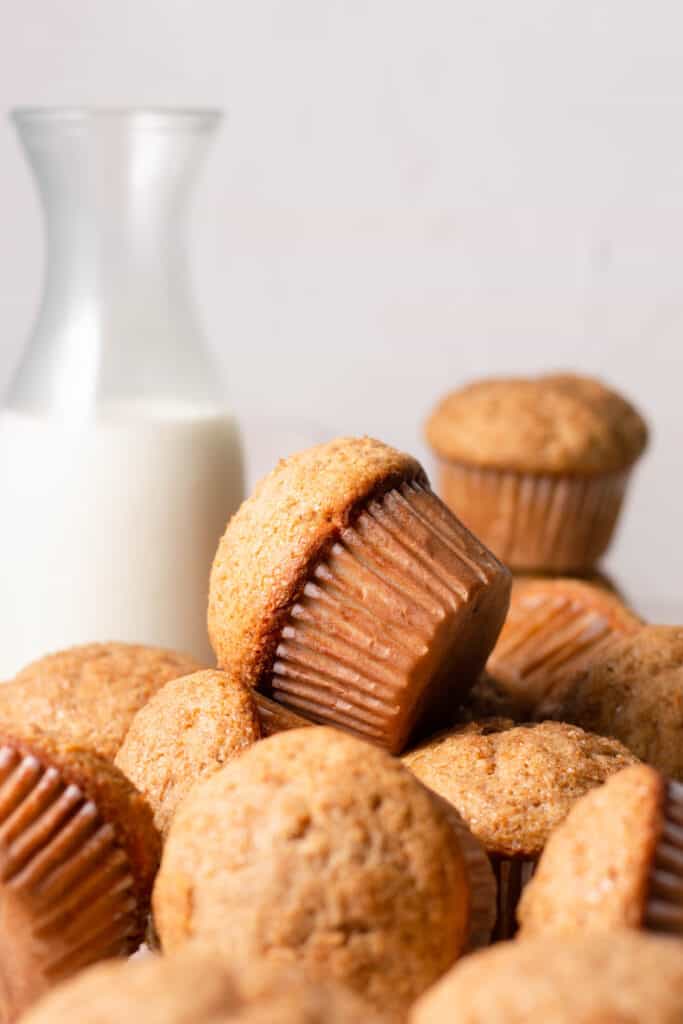 carrot cake muffins stacked on top of each other