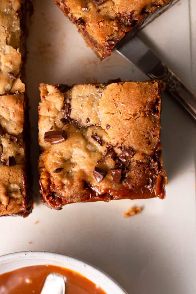 salted caramel oatmeal cookie bars on a board