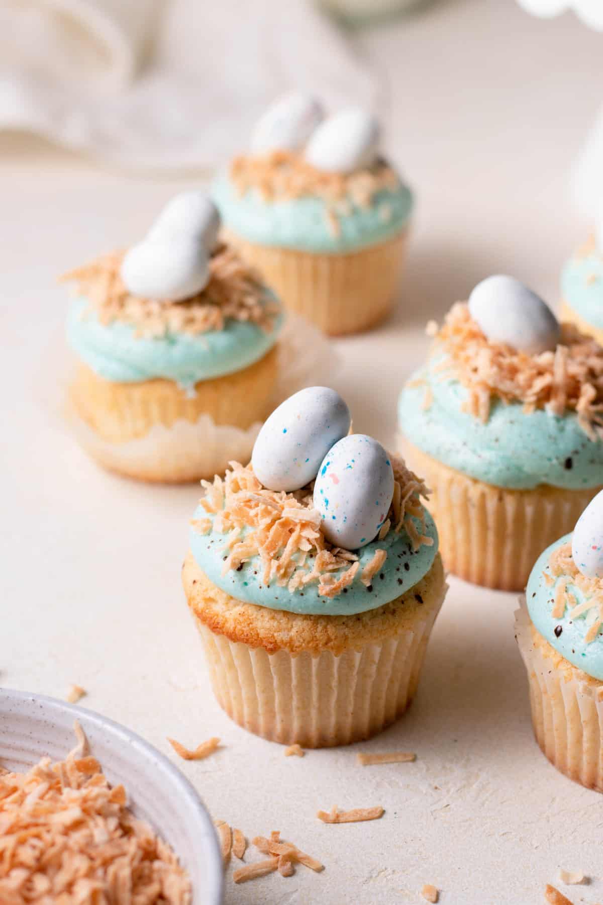 robins egg easter cupcakes on a board