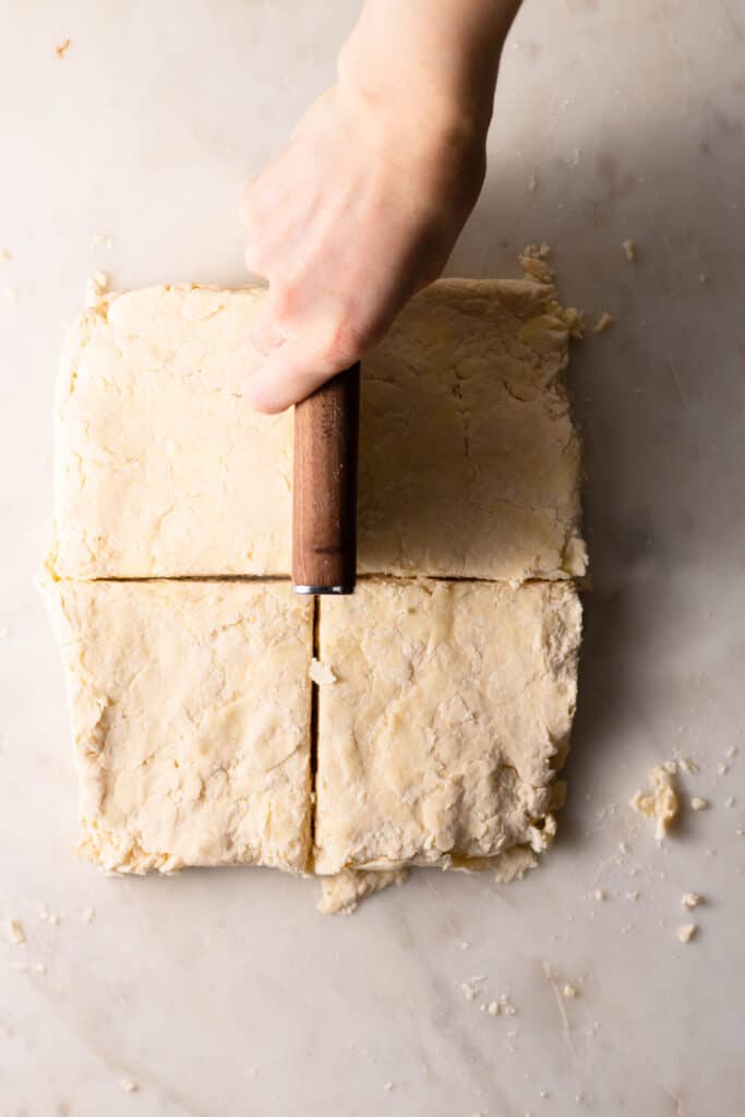 adding layers to biscuit dough