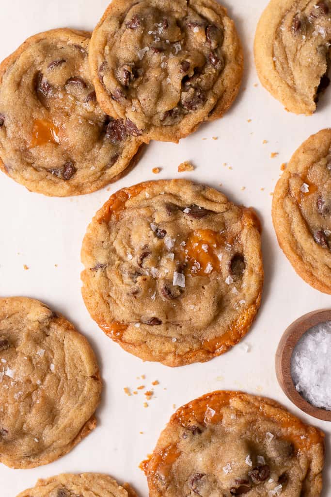salted caramel chocolate chip cookies on a board