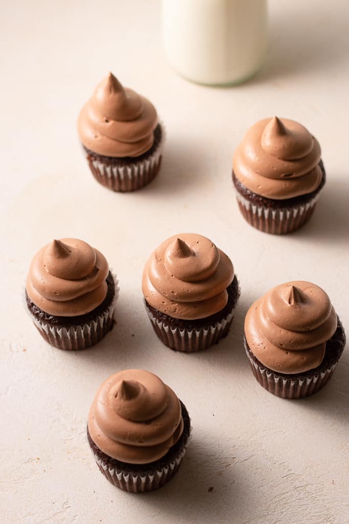 chocolate fudge cupcakes on a board