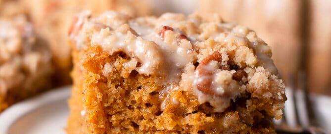 pumpkin coffee cake on a plate with a fork