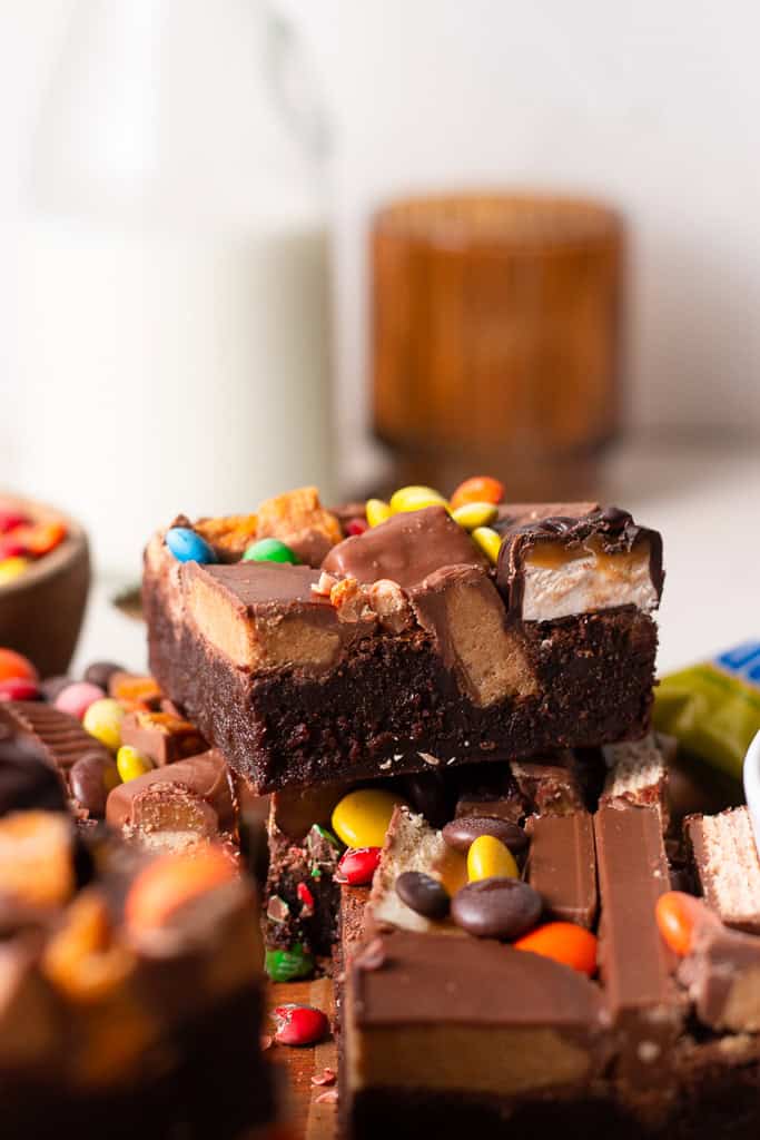 up close shot of a brownie stacked on top of another one.