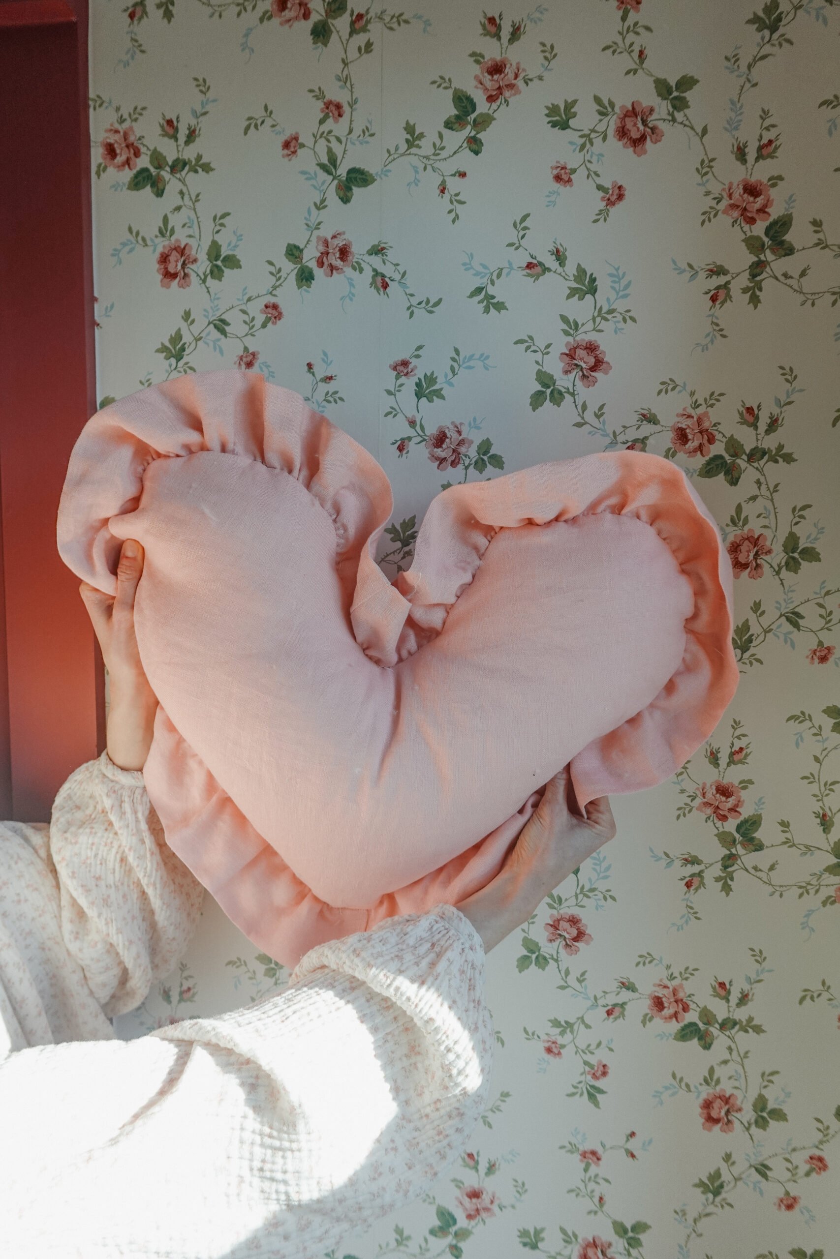 heart-shaped ruffle pillow.
