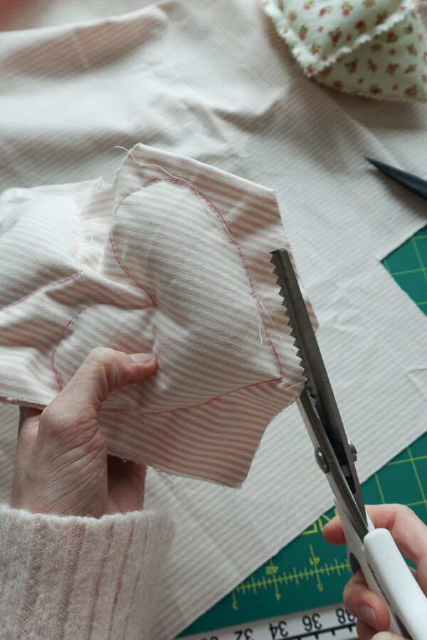 trimming with pinking shears.