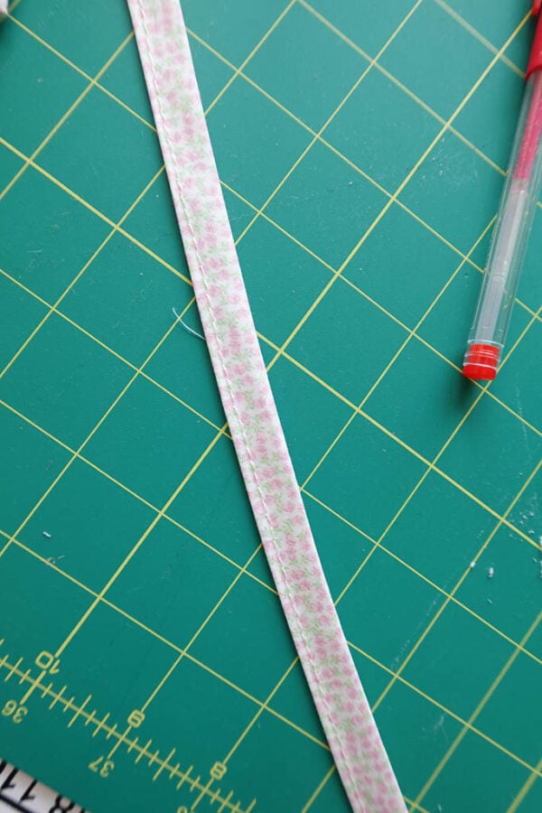sewing the bias tape ties.