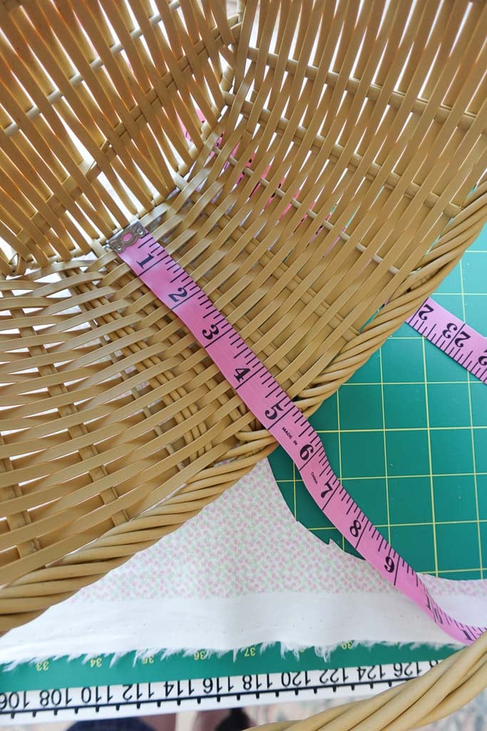 measuring the height of the basket.