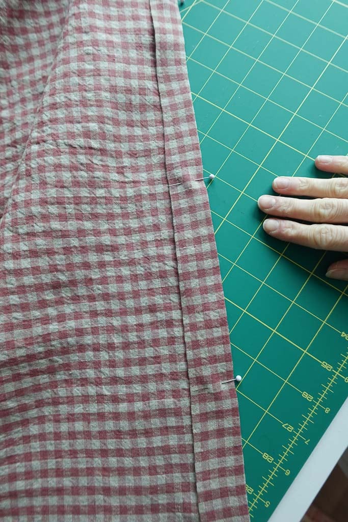 side hems with 1-inch double hem.